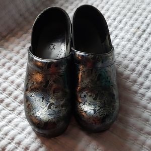 Danskos Tooled Leather Clogs